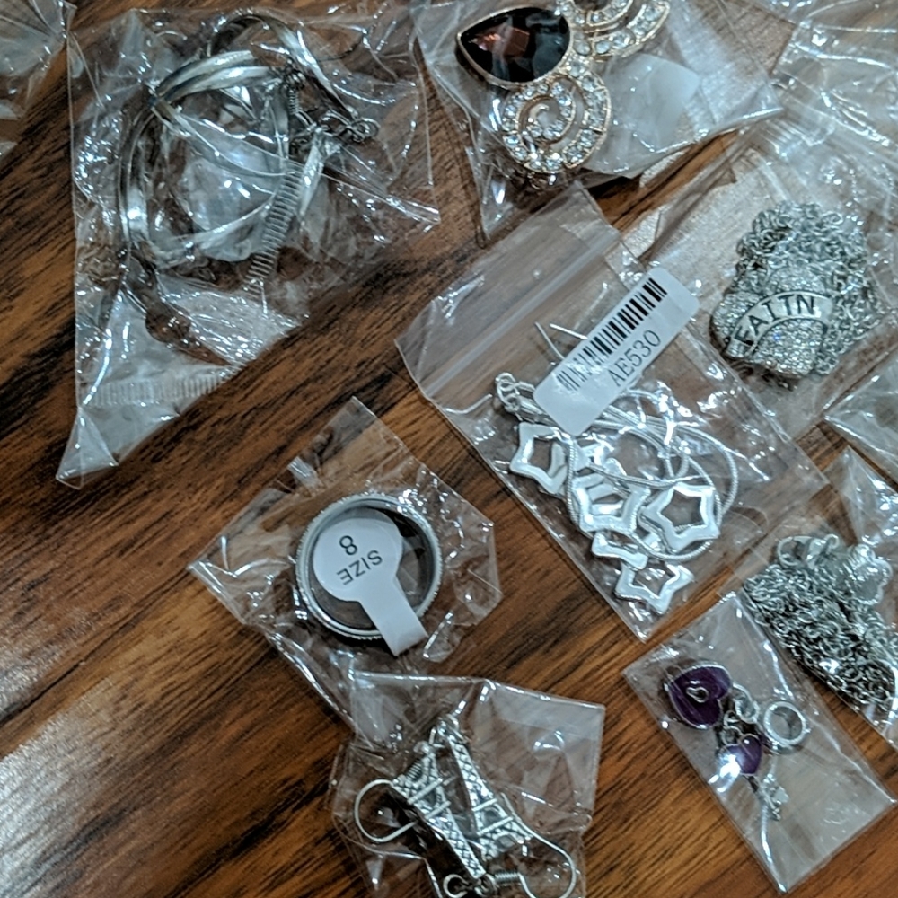 Rings, necklaces, earrings, and charms